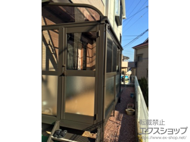 大阪府箕面市のLIXIL リクシル（トステム）のカーポート ほせるんですII R型 床納まり ランマ無 積雪〜20cm対応 施工例