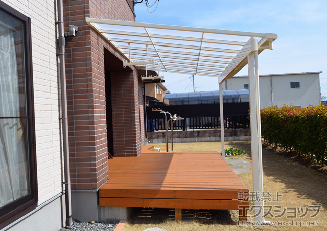 宮城県登米市のLIXIL リクシル（トステム）のテラス屋根 ライザーテラスII F型 1500 テラスタイプ 単体 積雪〜50cm対応+吊り下げ物干し 施工例