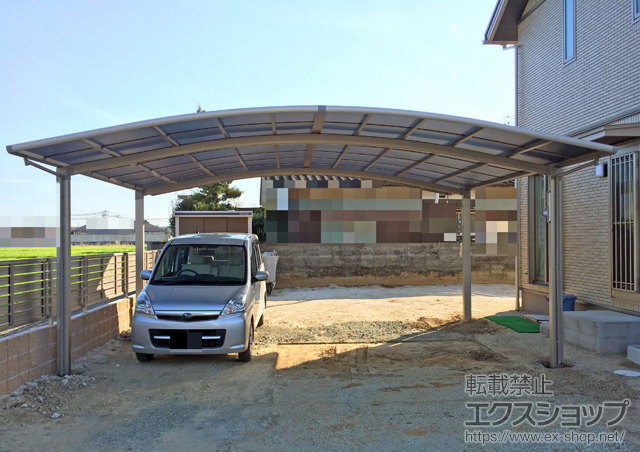 福岡県みやま市のLIXIL リクシル（トステム）のカーポート カーブポートシグマIII ワイド 積雪〜20cm対応＋収納式物干し 標準 2本入り×1セット 施工例