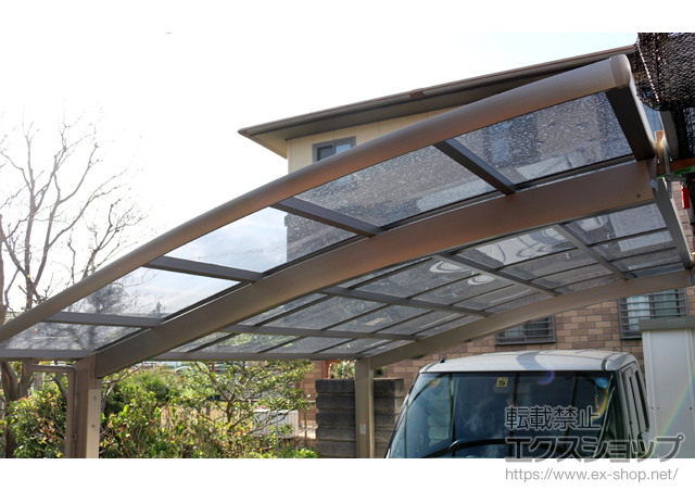 大阪府摂津市のLIXIL リクシル（トステム）のカーポート カーブポートシグマIII 積雪〜20cm対応 施工例