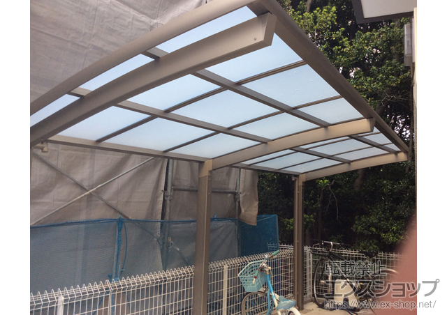 兵庫県西宮市のLIXIL リクシル（トステム）のカーポート カーブパークシグマIII オープンタイプ 積雪〜20cm対応 施工例