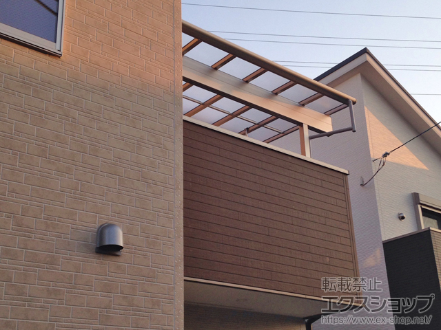 大阪府茨木市ののバルコニー・ベランダ屋根 ヴェクターテラス F型 1500 屋根タイプ 単体 積雪〜50cm対応＋吊り下げ式物干し 施工例