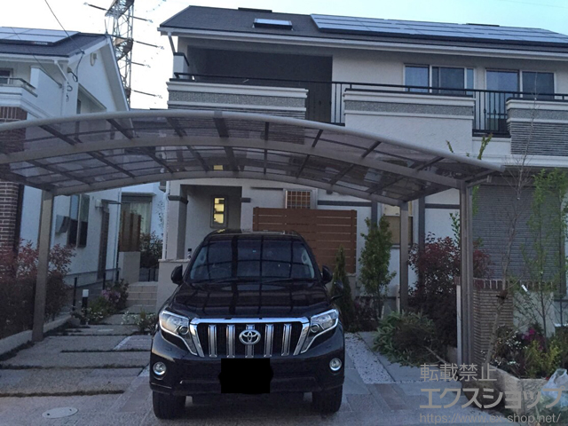 京都府相楽郡精華町のLIXIL リクシル（トステム）のカーポート カーブポートシグマIII ワイド 積雪〜20cm対応 施工例