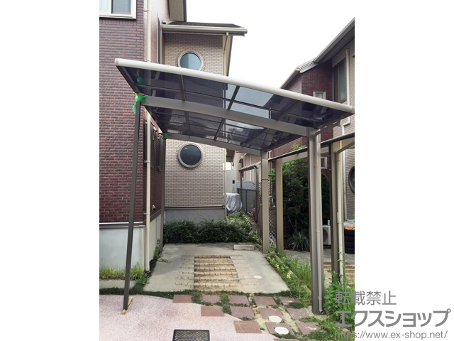 大阪府枚方市のLIXIL リクシル（トステム）のカーポート カーブポートシグマIII 積雪〜20cm対応 施工例