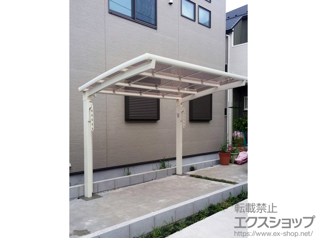 東京都国立市のLIXIL リクシル（トステム）のサイクルポート・駐輪場 カーブポートシグマIII ミニ 積雪〜20cm対応＋収納式物干し 標準 2本入 施工例