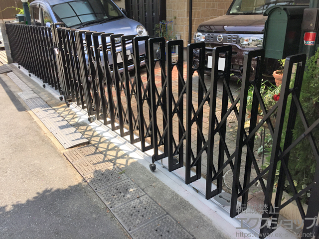 東京都杉並区のLIXIL リクシル(新日軽)のカーゲート ニューエクジスXA型 ガイドレール式 片開き親子 44SFR 施工例