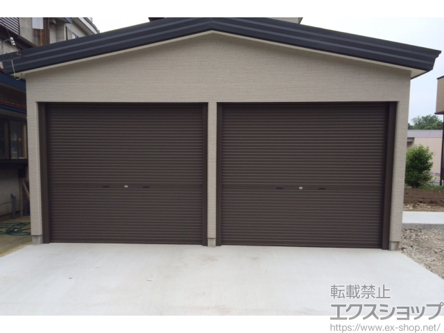青森県下北郡佐井村のLIXIL リクシル（トステム）のガレージシャッター ガレージシャッタークワトロ 手動式 内部付タイプ 施工例