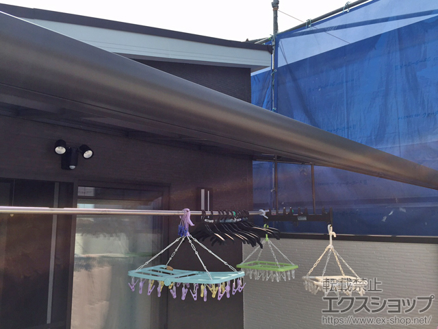 大阪府豊中市のLIXIL リクシル（トステム）のバルコニー・ベランダ屋根 パワーアルファ L型 屋根タイプ 単体 積雪〜30cm対応 施工例