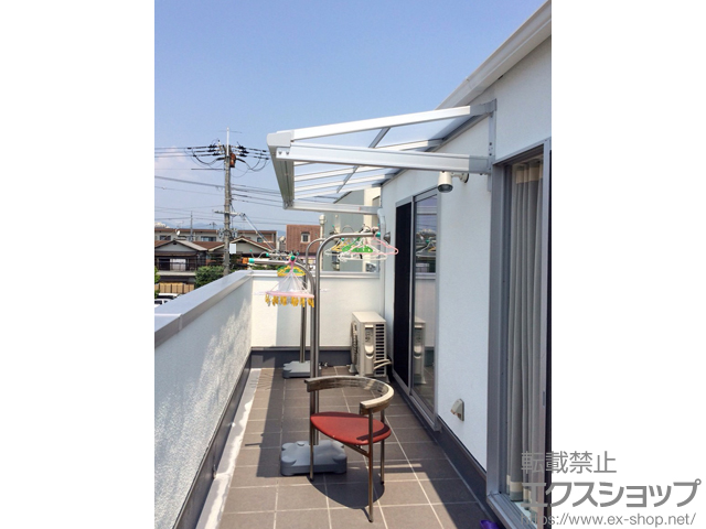 兵庫県尼崎市のLIXIL リクシル（トステム）のバルコニー・ベランダ屋根 ライザーテラスII F型 ルーフタイプ 単体 積雪〜20cm対応 施工例