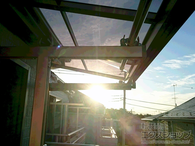 東京都狛江市のLIXIL リクシル（トステム）のバルコニー・ベランダ屋根 ライザーテラスII F型 ルーフタイプ 単体 積雪〜20cm対応 施工例