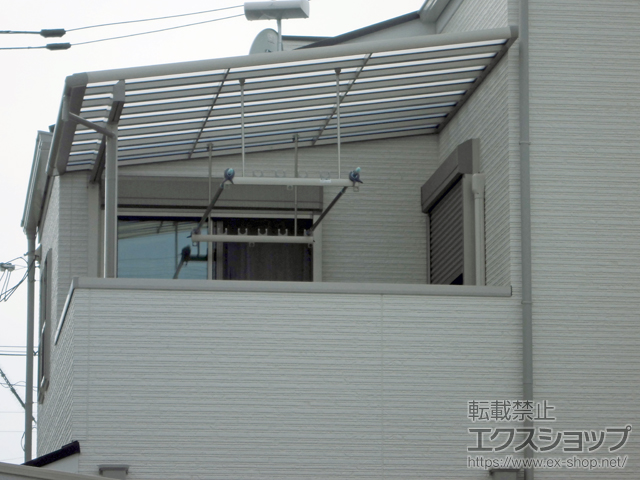 兵庫県尼崎市のLIXIL リクシル（トステム）のバルコニー・ベランダ屋根 パワーアルファ F型 屋根タイプ 単体 積雪〜30cm対応 施工例