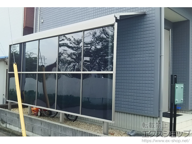 愛媛県新居浜市のLIXIL リクシル（トステム）のテラス屋根 ライザーテラスII F型 テラスタイプ 単体 積雪〜20cm対応＋前面スクリーン 施工例