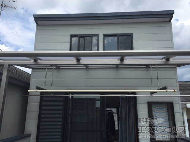 京都府京都市のLIXIL リクシル（トステム）のバルコニー・ベランダ屋根 パワーアルファ F型 屋根タイプ 単体 積雪〜30cm対応＋パワーアルファ用 前後移動物干し 標準 2本入 施工例