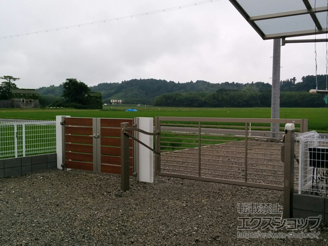 滋賀県蒲生郡日野町ののカーゲート スウィングアップゲート1型 横格子 電動式 施工例