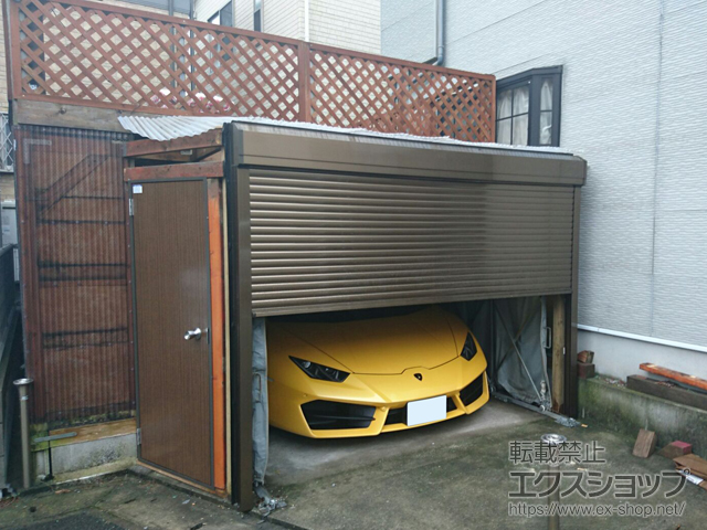 千葉県市川市のLIXIL リクシル（トステム）のガレージシャッター ガレージシャッタークワトロ 電動式 外部付タイプ 施工例