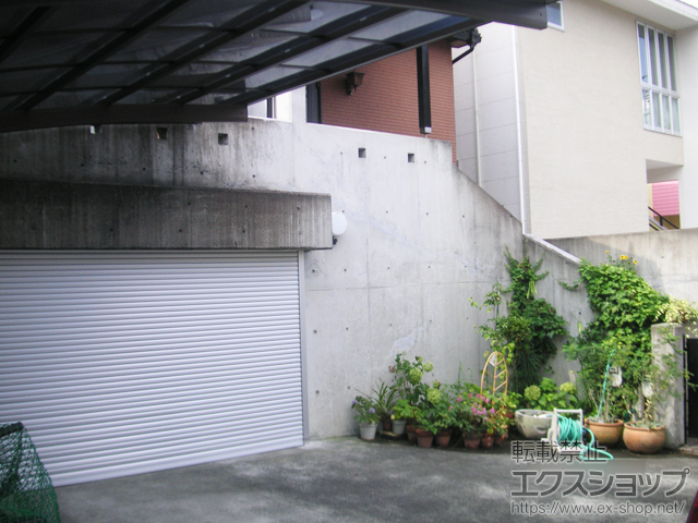 愛知県名古屋市のLIXIL リクシル（トステム）のガレージシャッター ガレージシャッタークワトロ 電動式 外部付タイプ 施工例