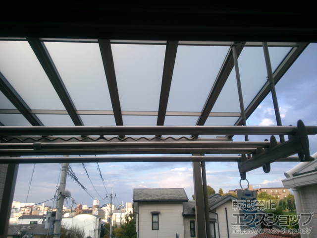 大阪府枚方市のLIXIL リクシル（トステム）のバルコニー・ベランダ屋根 パワーアルファ F型 屋根タイプ 単体 積雪〜30cm対応 施工例