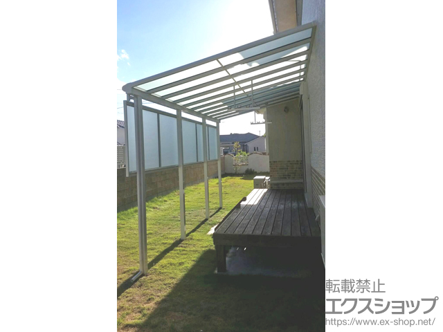 鹿児島県出水市ののテラス屋根 ヴェクターテラス F型 テラスタイプ 単体 積雪〜20cm対応＋吊り下げ式 固定物干し 標準2本入り×1セット＋前面パネル 1段 柱標準・600Ｎ用 施工例