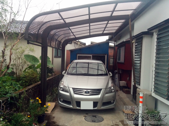 宮崎県都城市のLIXIL リクシル（トステム）のカーポート テールポートシグマIII 積雪〜20cm対応＋着脱式サポート（補助柱）ロング柱23用 1本入り 施工例