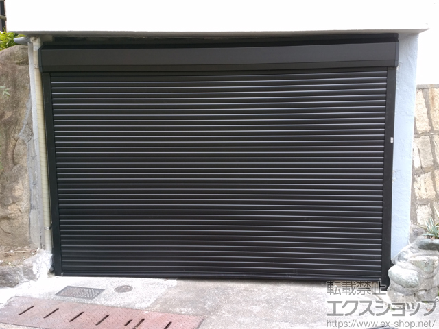 兵庫県神戸市のLIXIL リクシル（トステム）のガレージシャッター リフォームシャッター イタリヤ 手動式 施工例
