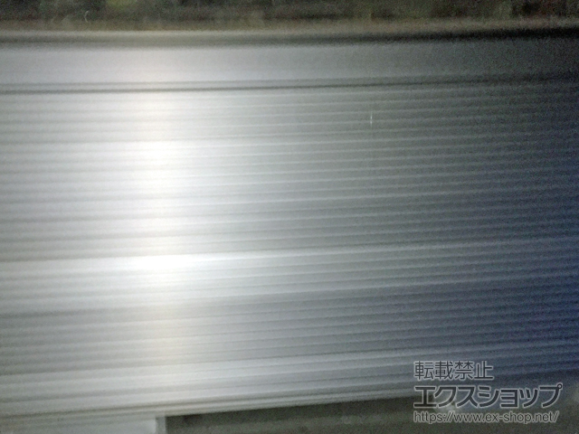 千葉県市川市のLIXIL リクシル（トステム）のガレージシャッター ガレージシャッタークワトロ 電動式 外部付タイプ 施工例