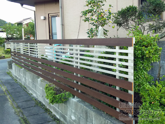 鳥取県鳥取市ののフェンス・柵 ルシアスフェンスH04型 横板+細横格子 木調カラー 自由柱 施工例