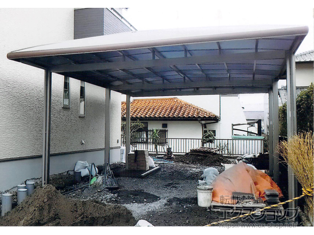 大分県由布市ののカーポート フーゴAプラス (アーチスタイル) ワイド 延長 木調色 積雪〜20cm対応 施工例