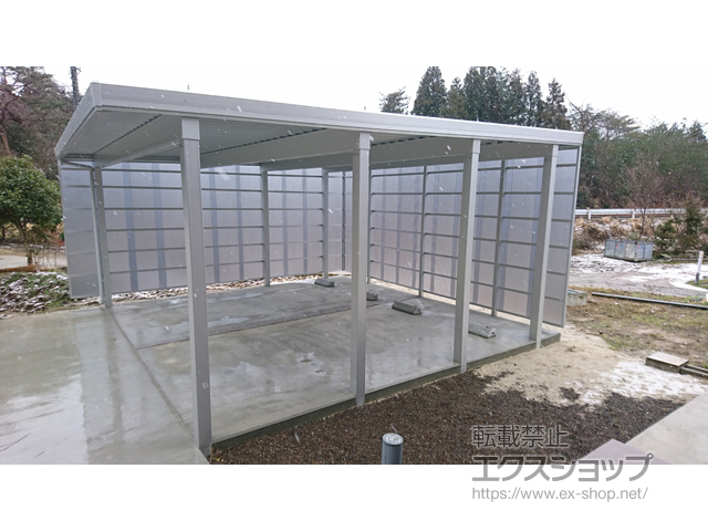 石川県鳳珠郡能登町のLIXIL リクシル（トステム）のカーポート テリオスポートIII 4500 2台用 角柱8本仕様 積雪〜150cm対応＋ テリオスポートIII サイドパネル（波板）L字囲い 施工例