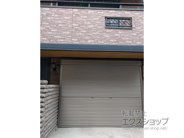 大阪府寝屋川市のLIXIL リクシル（トステム）のガレージシャッター ガレージシャッタークワトロ 手動式 外部付タイプ 施工例