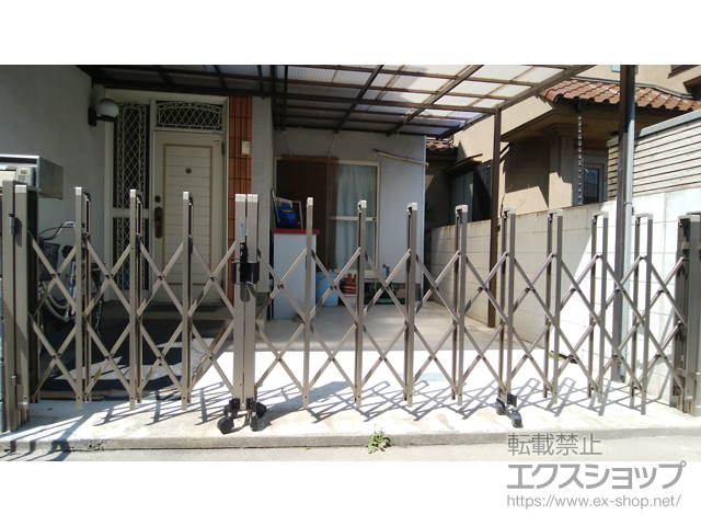 兵庫県尼崎市ののカーゲート トリップゲート RB型 ノンレール 両開き親子 40WO(13S+27M) 施工例