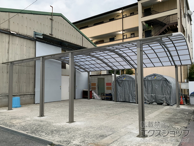 大阪府八尾市のLIXIL リクシル（トステム）のカーポート リベルポートシグマIII 縦連棟 6台用 積雪〜20cm対応 施工例