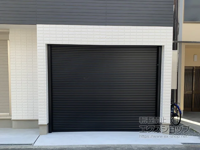 大阪府大阪市のLIXIL リクシル(トステム)のガレージシャッター ガレージシャッタークワトロ 電動式 内部付タイプ 施工例