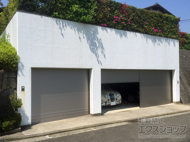 神奈川県横浜市のLIXIL リクシル（トステム）のガレージシャッター ガレージシャッタークワトロ 電動式 内部付タイプ※外部停電時開閉機構 施工例