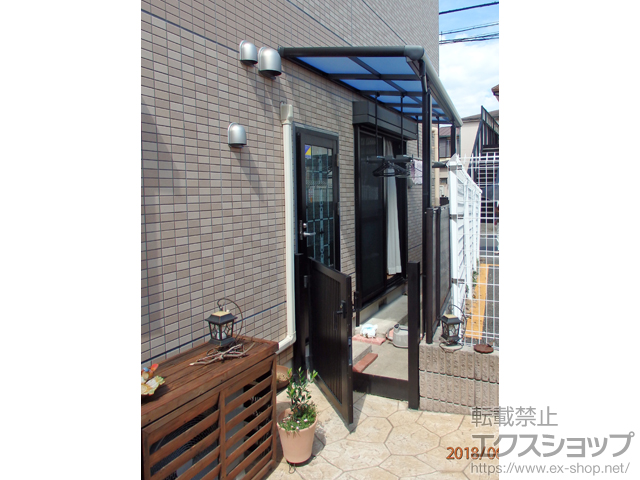 神奈川県横浜市のLIXIL リクシル（トステム）のテラス屋根 パワーアルファ F型 テラスタイプ 単体 積雪〜30cm対応 *正面台形納まり 施工例