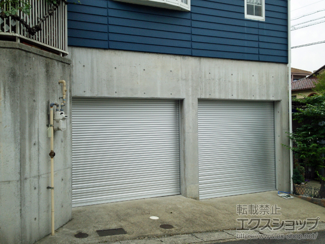 愛知県長久手市のLIXIL リクシル（トステム）のガレージシャッター ガレージシャッタークワトロ 電動式 内部付タイプ 施工例