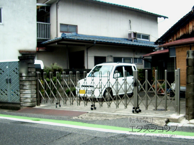 岡山県倉敷市ののカーゲート トリップゲート RB型 ノンレール 両開き親子 51WO(13S+38M) 施工例