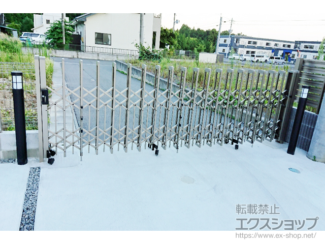 福島県双葉郡富岡町の三協アルミカーゲート施工例 ポチガード 片開きタイプ キャスタータイプ 37s 1 福島県双葉郡富岡町の三協アルミカーゲート施工例 ポチガード 片開きタイプ キャスタータイプ 37s 1