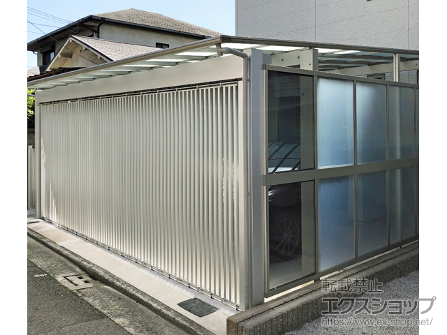 大阪府堺市ののガレージシャッター 【特注】シャレート1型 アルミ色タイプ 電動式 施工例