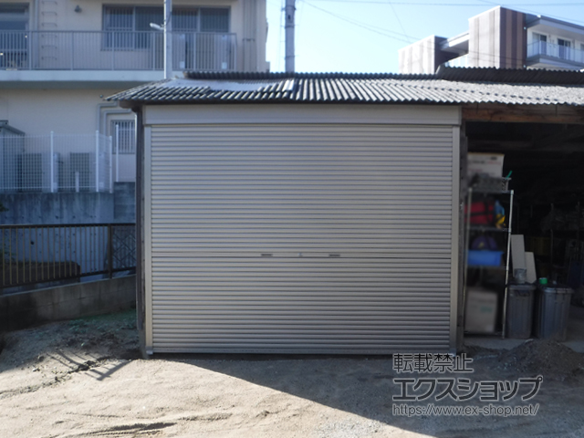福岡県福岡市のLIXIL リクシル（トステム）のガレージシャッター ガレージシャッタークワトロ 手動式 外部付タイプ 施工例