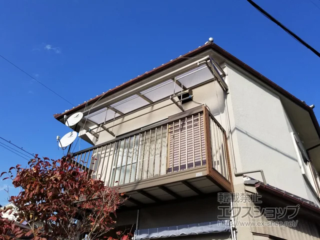 大阪府河内長野市のLIXIL(リクシル)のバルコニー・ベランダ屋根 スピーネ R型 ルーフタイプ 単体 積雪～20cm対応＋吊下げ物干しAセット　標準　2本入り×1セット 施工例
