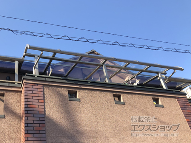 大阪府茨木市のLIXIL リクシル（トステム）のバルコニー・ベランダ屋根 パワーアルファ RB型 屋根タイプ 単体 積雪〜30cm対応 施工例
