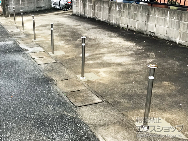 福岡県福岡市ののカーゲート スペースガード（車止め）F48型 埋込式 キー付き 施工例