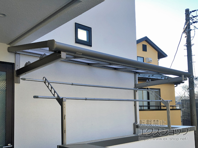 東京都世田谷区のLIXIL リクシル（トステム）のバルコニー・ベランダ屋根 パワーアルファ F型 ルーフタイプ 単体 積雪〜30cm対応 施工例