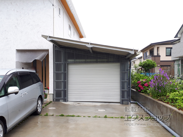 宮城県宮城郡七ヶ浜町のLIXIL リクシル（トステム）のガレージシャッター ガレージシャッタークワトロ 電動式 内部付タイプ※外部停電時開閉機構 施工例