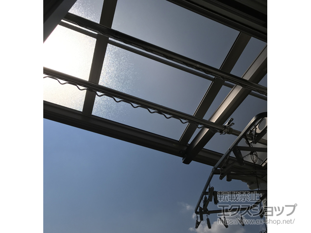 愛知県名古屋市のLIXIL リクシル（トステム）のバルコニー・ベランダ屋根 パワーアルファ F型 ルーフタイプ 単体 積雪〜30cm対応 施工例
