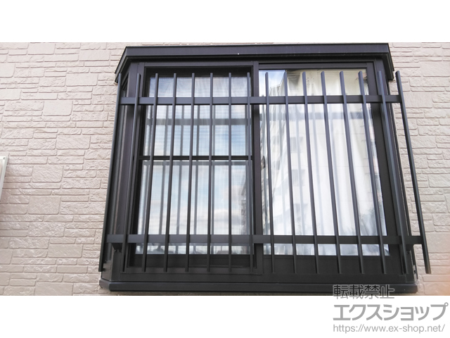 愛知県安城市のLIXIL リクシル（トステム）面格子・窓格子施工例(【特注】アルミ面格子 縦C型:63935668-1)