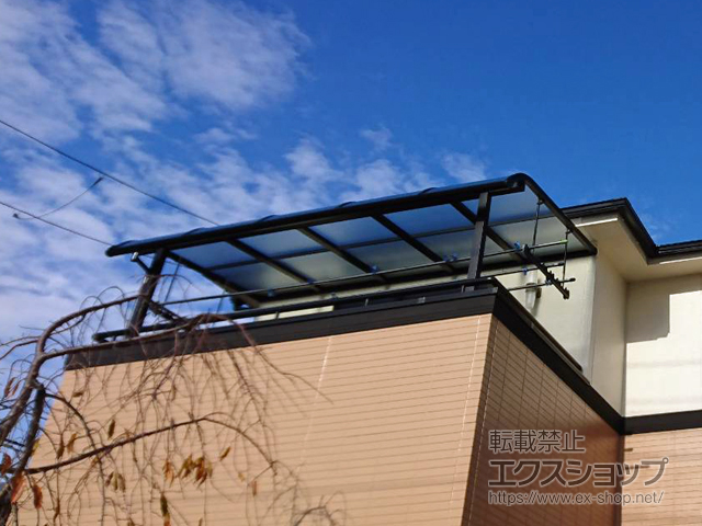 大阪府泉南市のLIXIL リクシル（トステム）のバルコニー・ベランダ屋根 パワーアルファ RB型 屋根タイプ 単体 積雪〜30cm対応 施工例