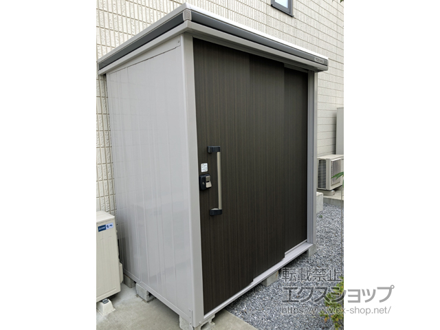 埼玉県越谷市のの物置・屋外倉庫 エルモ 一般型 1870×1170×2121 LMD-1811-【DW(ダークウッド)】 施工例