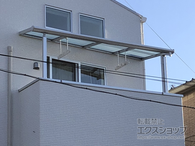 神奈川県川崎市のLIXIL リクシル（トステム）のバルコニー・ベランダ屋根 パワーアルファ F型 屋根タイプ 単体 積雪〜30cm対応 *正面台形納まり 施工例