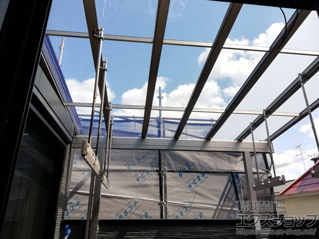 兵庫県西宮市のLIXIL リクシル（トステム）のバルコニー・ベランダ屋根 パワーアルファ F型 屋根タイプ 単体 積雪〜30cm対応 施工例